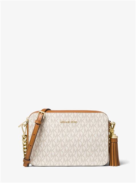 michael kors ginny vs jet set|Ginny Medium Jet Set Girls Crossbody Bag .